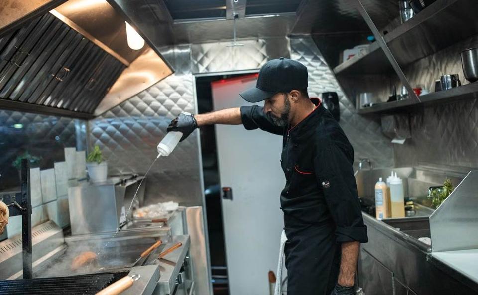 Cook seasoning food on the grill